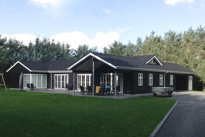 H. E. Magnild Arkitektfirma